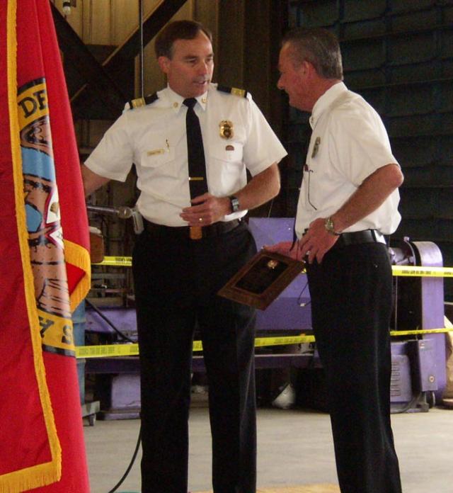 Chief Bamattre presents award to Capt. Lee